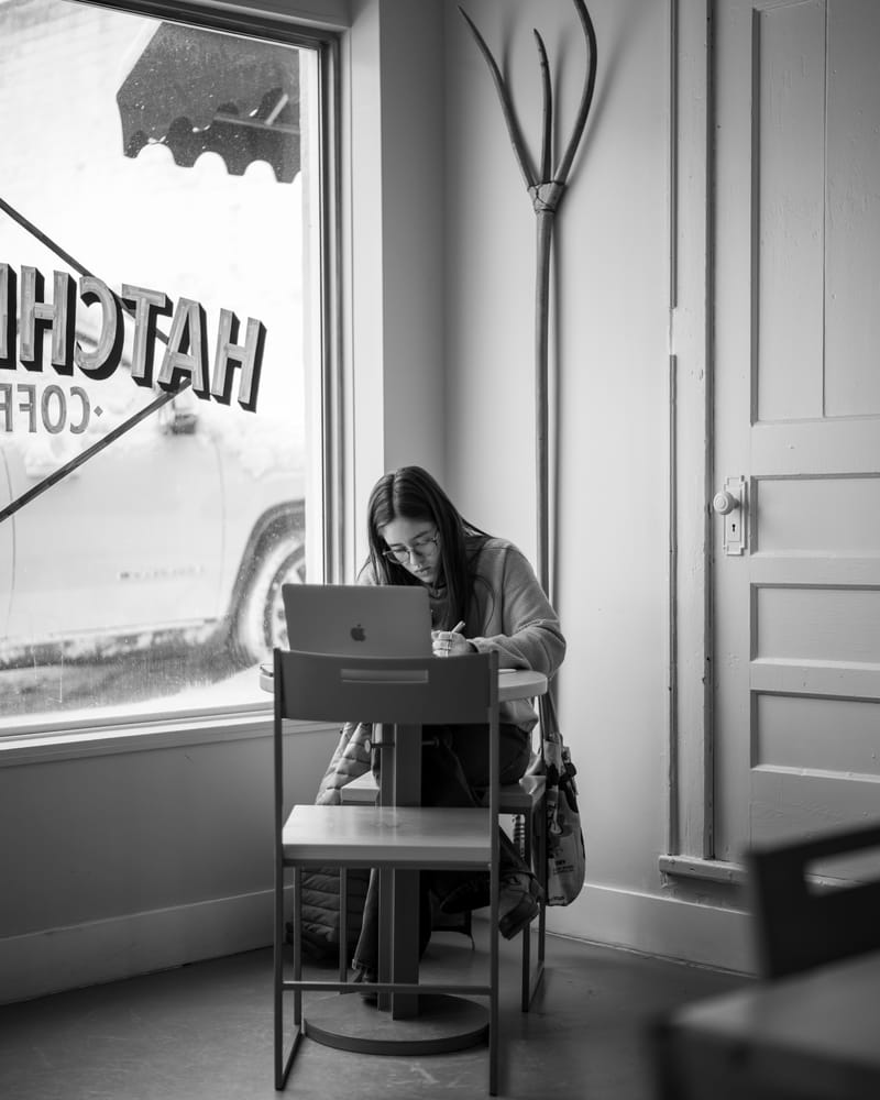 Sidewalk bistro tables outside Hatchet West